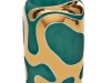 Forget those boring, plain glass vases that you find on everyone’s coffee table. This handmade, artistic ceramic vase is inspired by the movement of lava and adorned with 22-karat gold. 
