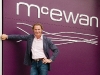 Mark McEwan stands proudly alongside one of his latest creations, a gourmet grocery store outfitted with fine dining service – minus the designer price tag.
