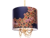 Light up your bedroom with this decadent, 22-karat gold chandelier, draped with  gold-plated vintage beads, chains and real pearls. 