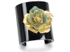 Wrap your wrist in Bochic’s black Bakelite cuff with jade and gold flower detailing to enrapture. 