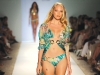A beautiful swimsuit should always be accompanied by an elegant cover-up. This  floor-length number will be sure to turn heads at the beach. 