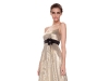 Whispering shimmers of seduction, this gilded metallic gown surrenders to the floor in effortless glamour.