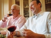 Peter Oliver and Michael Bonacini enjoy the moment with good company and wine. 
