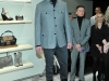 Model wears a grey flannel military jacket over a charcoal grey cargo trouser tucked into lace-up boots, all from the Boss Black collection, Photos By George Pimentel/WireImage 