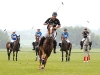 Alain Clery speeds towards the ball during the match between Calvin Klein and Shawn Coulson. 