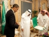President Barack Obama looks at the King Abdul Aziz Order of Merit presented to him by Saudi King Abdullah bin Abdul Aziz at the start of their bilateral meeting at the King's Farm in Riyadh, Saudi Arabia, June 3, 2009.