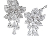 Diamond earrings from coveted Christie's auction house complement any one of Riva's classic bridal gowns.
