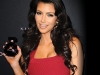 Kim Kardashian wearing an Amrapali gold tiger bangle with diamonds, an Amrapali gold snake bracelet with rubies and rose cut bangles