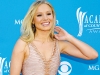 Actress Kristen Bell wearing Mimi So peach sapphire earrings in 18k yellow gold
