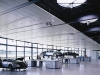 Unlike conventional automobile plants that hum with robots and human activity, the Bugatti production facility resembles an art gallery. 