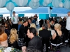 Gala-goers dine under a delightfully decorated tent. 