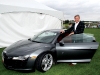 Justin Fogarty slides with a smile into his powerful Audi R8.